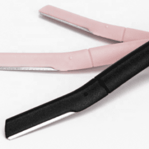 A pink Dermaplane face razor-eyebrow hair trimmer