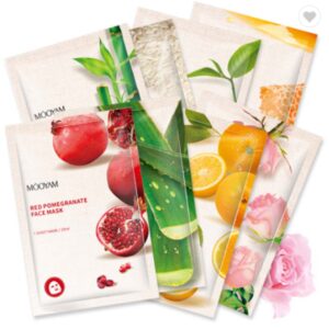 A pack of Red Pomegranate face masks with fruit and flowers.