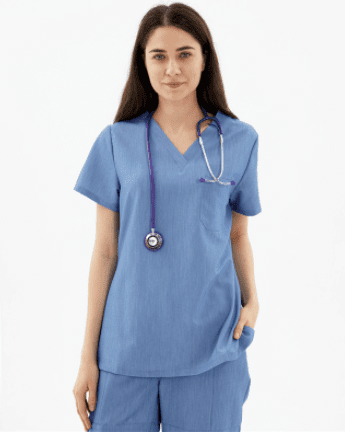A woman wearing a blue Nursing Scrub Set and a stethoscope.